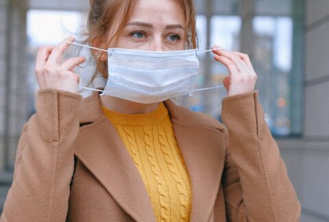 woman wearing face mask Post Acute COVID Infection