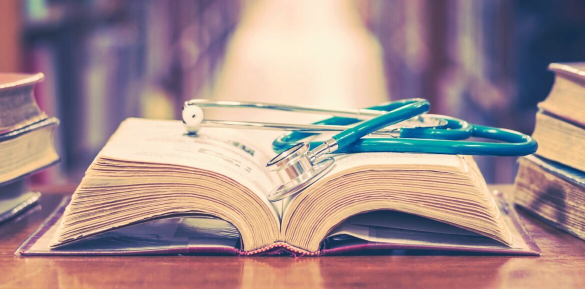 blood sugar detox course slider book open on table. for courses