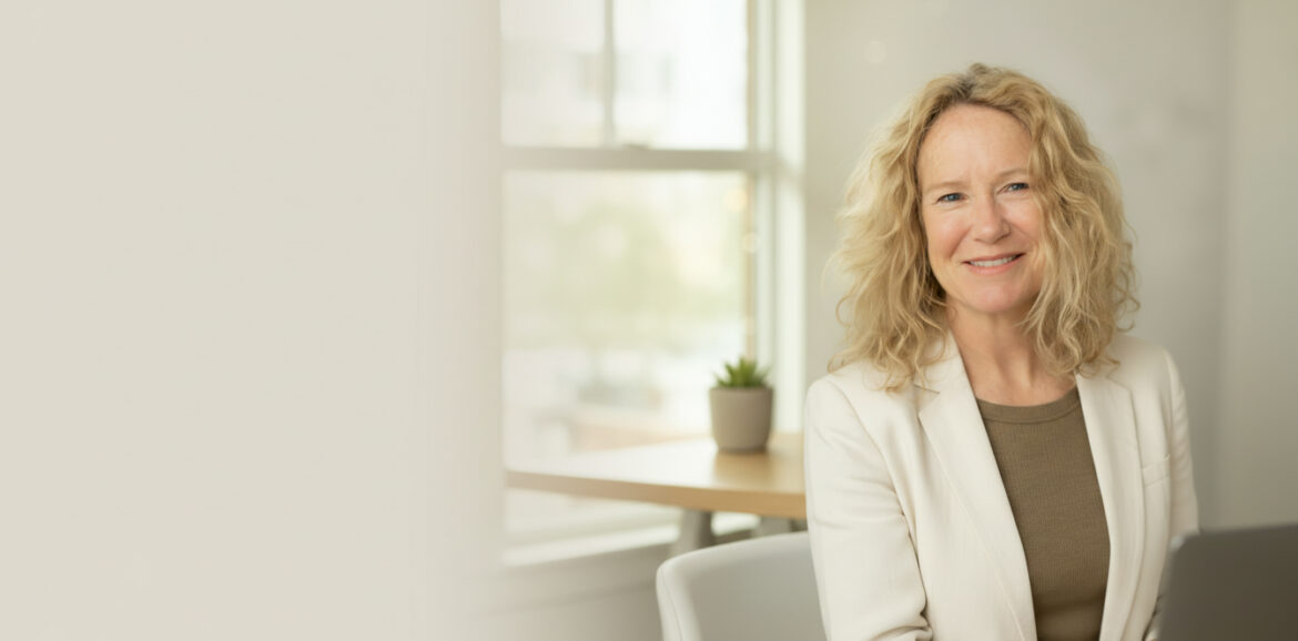 NET mind body with dr. keri. keri sitting at her desk.